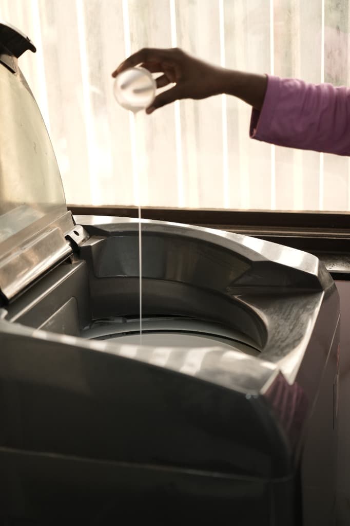 Daily laundry with liquid detergent in washing machine